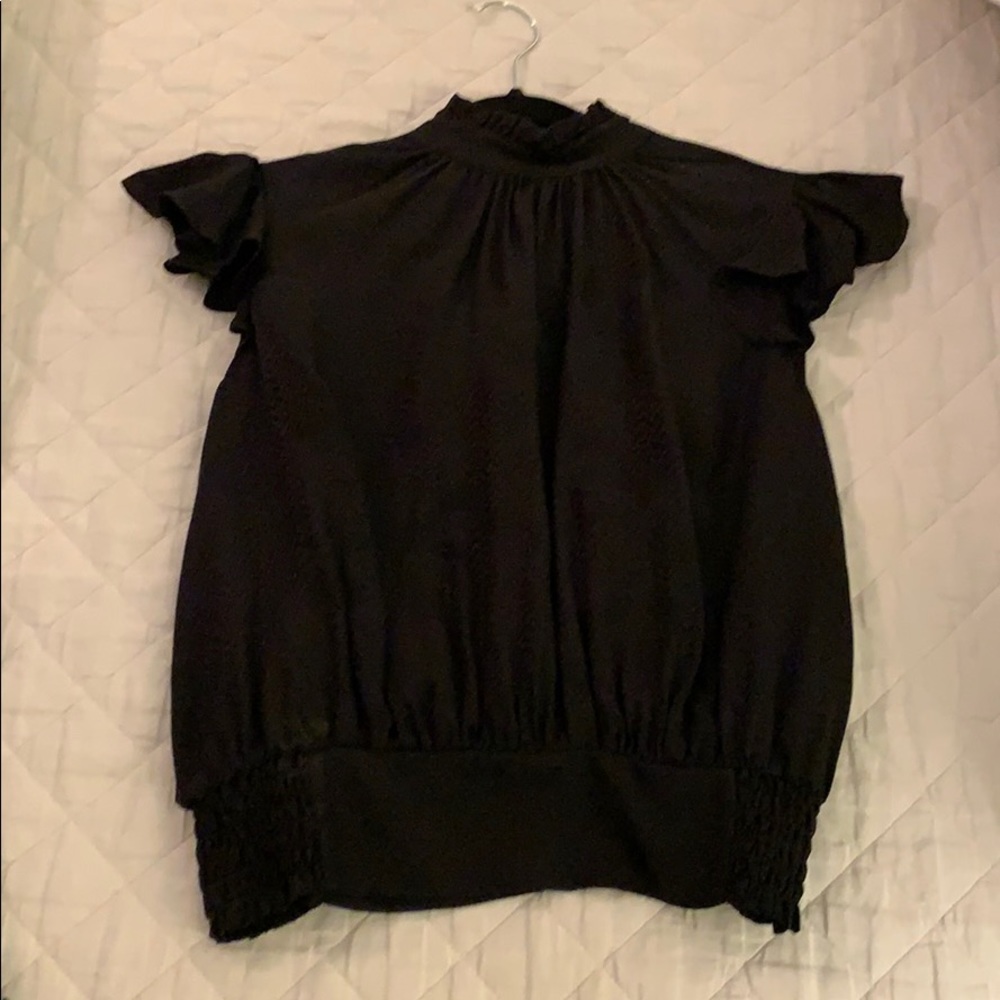 Frame cap ruffle sleeved silk smocked blouse